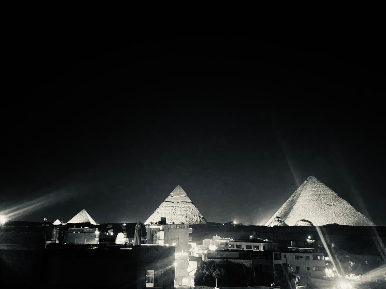 Pyramids Gate Hotel Kafrat al Jabal Bagian luar foto