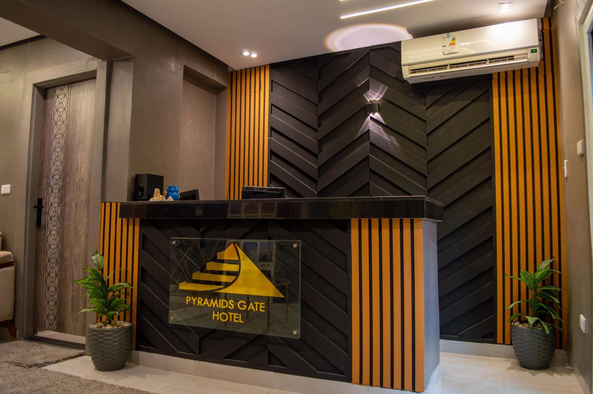 Pyramids Gate Hotel Kafrat al Jabal Bagian luar foto